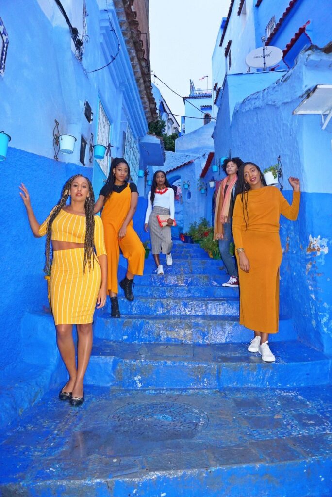 a group pecture in Chefchaouen during the 10 days tour from Casablanca