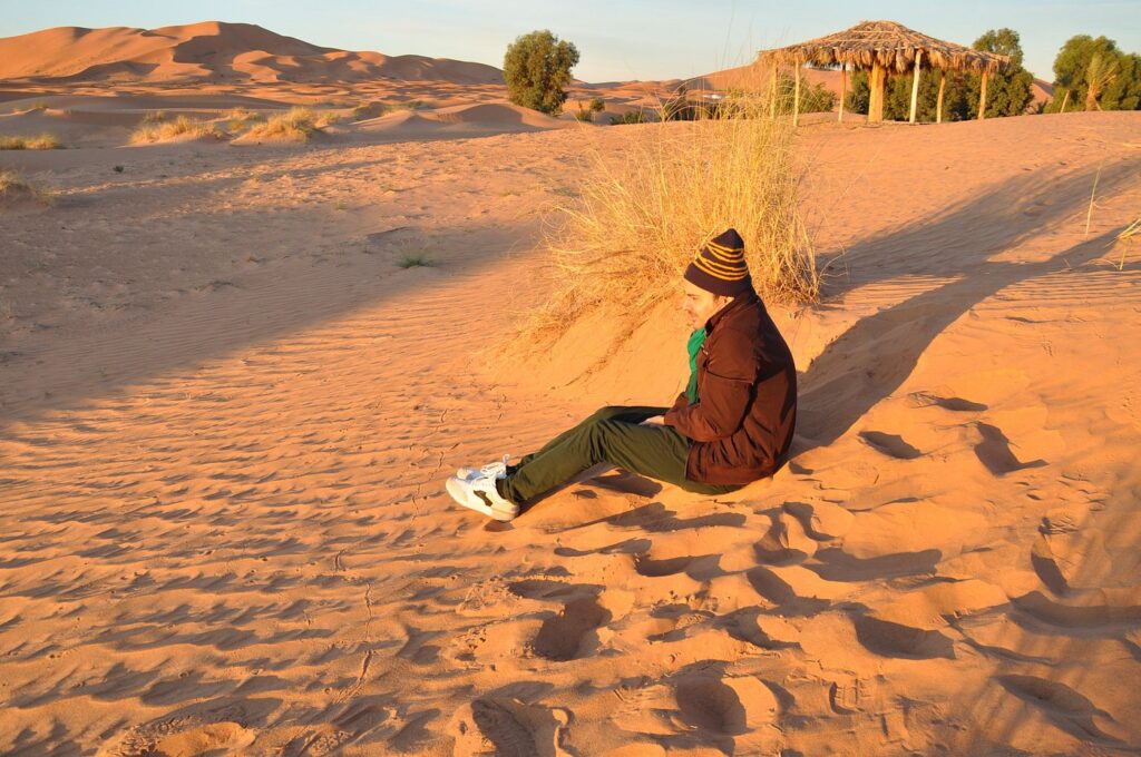 Enjoying the sunrise in the sand dunes during the 3D/2N desert tour